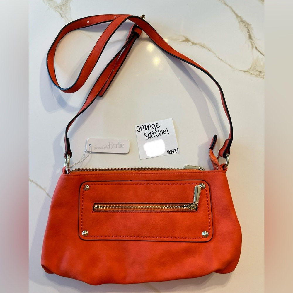 Orange satchel for sale. Good condition.